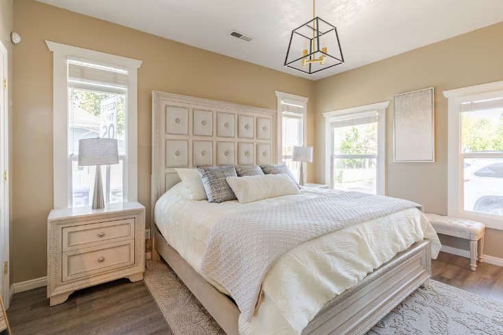 Master bedroom with king bed and designer furnishings